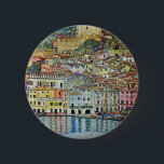 Malcesine on Lake Garda By Gustav Klimt 6 Cm Round Badge<br><div class="desc">Malcesine on Lake Garda (1913) by Gustav Klimt is a vintage Victorian Era Art Nouveau fine art symbolism painting. A beautiful view of the Italian city of Malcesine with buildings and houses on the edge of the harbour. The homes and boats cast a reflection in the calm water. You can...</div>