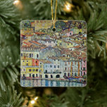 Malcesine on Lake Garda By Gustav Klimt Ceramic Tree Decoration<br><div class="desc">Malcesine on Lake Garda (1913) by Gustav Klimt is a vintage Victorian Era Art Nouveau fine art symbolism painting. A beautiful view of the Italian city of Malcesine with buildings and houses on the edge of the harbor. The homes and boats cast a reflection in the calm water. You can...</div>
