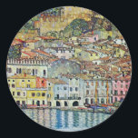 Malcesine on Lake Garda By Gustav Klimt Classic Round Sticker<br><div class="desc">Malcesine on Lake Garda (1913) by Gustav Klimt is a vintage Victorian Era Art Nouveau fine art symbolism painting. A beautiful view of the Italian city of Malcesine with buildings and houses on the edge of the harbour. The homes and boats cast a reflection in the calm water. You can...</div>