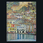 Malcesine on Lake Garda By Gustav Klimt Notebook<br><div class="desc">Malcesine on Lake Garda (1913) by Gustav Klimt is a vintage Victorian Era Art Nouveau fine art symbolism painting. A beautiful view of the Italian city of Malcesine with buildings and houses on the edge of the harbour. The homes and boats cast a reflection in the calm water. You can...</div>