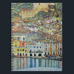 Malcesine on Lake Garda By Gustav Klimt Notebook<br><div class="desc">Malcesine on Lake Garda (1913) by Gustav Klimt is a vintage Victorian Era Art Nouveau fine art symbolism painting. A beautiful view of the Italian city of Malcesine with buildings and houses on the edge of the harbour. The homes and boats cast a reflection in the calm water. You can...</div>
