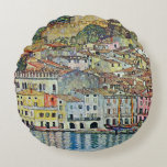 Malcesine on Lake Garda By Gustav Klimt Round Cushion<br><div class="desc">Malcesine on Lake Garda (1913) by Gustav Klimt is a vintage Victorian Era Art Nouveau fine art symbolism painting. A beautiful view of the Italian city of Malcesine with buildings and houses on the edge of the harbour. The homes and boats cast a reflection in the calm water. You can...</div>
