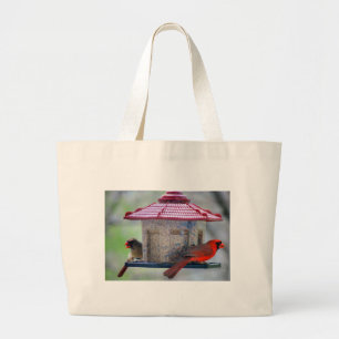 Male and Female Cardinal Eating a Snack Large Tote Bag