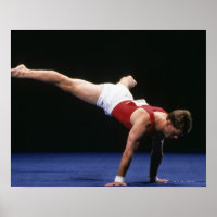 Male gymnast peforming a routine in the floor