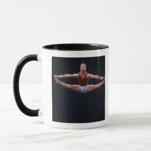 Male gymnast performing on the floor exercise mug