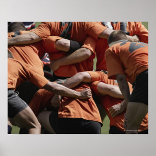 Male rugby players in scrum, rear view poster