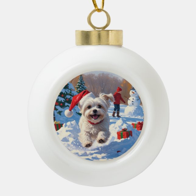 Maltese Dog Running in Snow with Christmas Hat Ceramic Ball Christmas Ornament (Front)