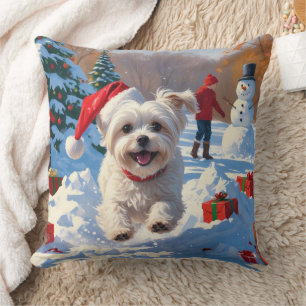 Maltese Dog Running in Snow with Christmas Hat Cushion