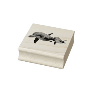 Mama and baby dolphin in ocean swimming rubber stamp