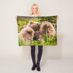 Mama bear nursing her two cubs, Lake Clark Nationa Fleece Blanket