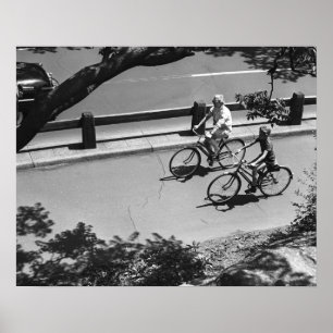 Man and Boy Cycling Poster