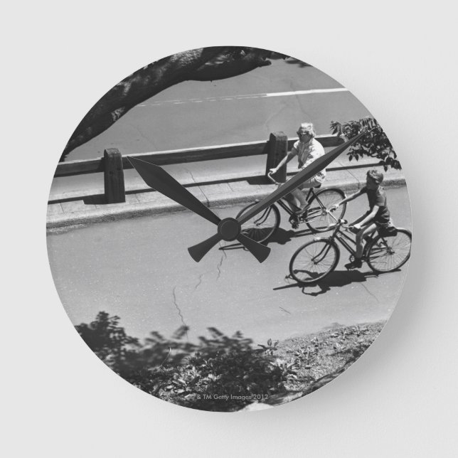 Man and Boy Cycling Round Clock (Front)