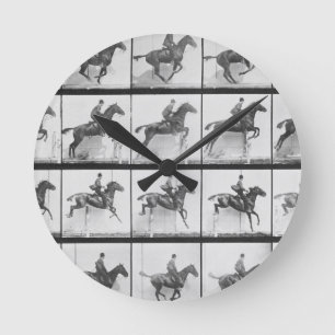Man and horse jumping a fence, plate 640 from 'Ani Round Clock