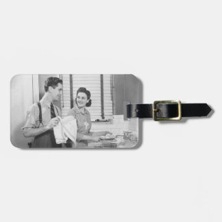 Man and Woman Doing Dishes Luggage Tag