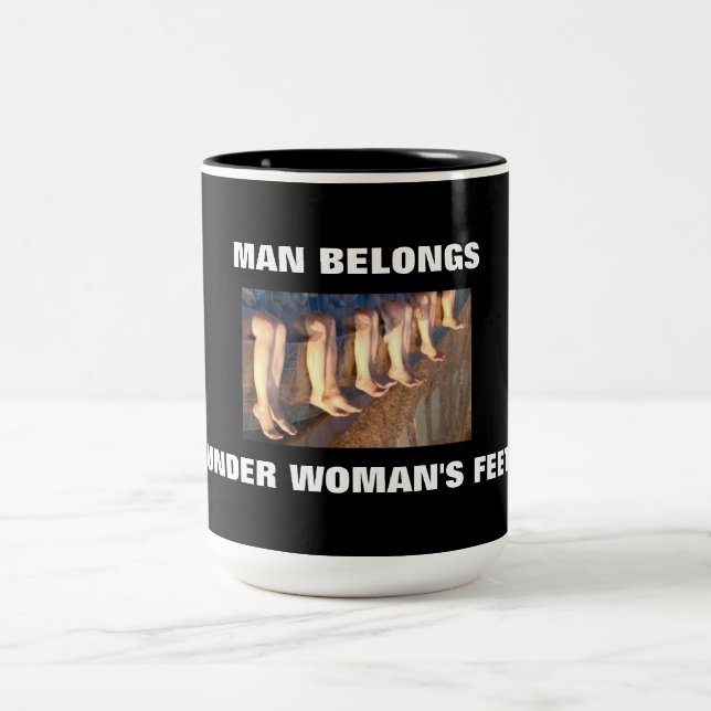 MAN BELONGS UNDER WOMAN'S FEET! Two-Tone COFFEE MUG (Center)