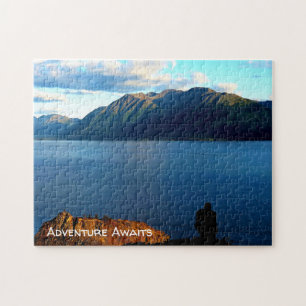 Man Crouches Contemplating Sunset Light in Alaska Jigsaw Puzzle