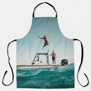 Man diving on pool apron