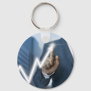 Man draws stock price touchscreen concept key ring