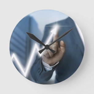 Man draws stock price touchscreen concept round clock