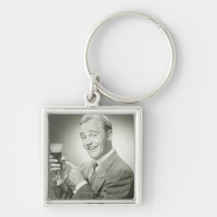 Man Drinking Key Ring
