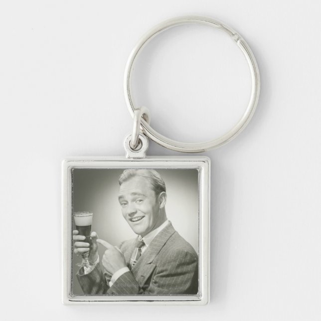Man Drinking Key Ring (Front)