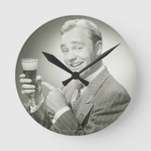 Man Drinking Round Clock