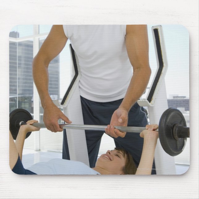 Man helping woman with weightlifting mouse mat (Front)