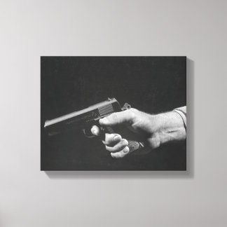 Man Holding Gun Canvas Print