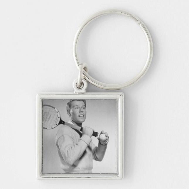 Man Holding Tennis Racket Key Ring (Front)