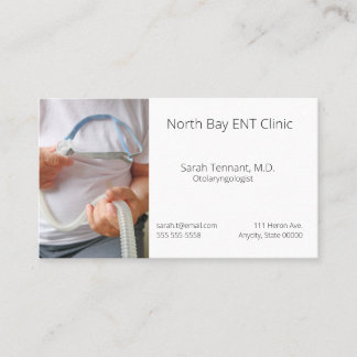 Man holds sleep apnoea device business card