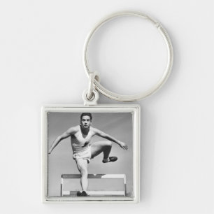 Man Hurdling Key Ring