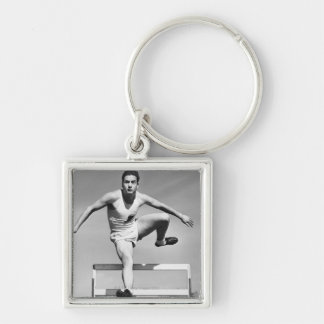 Man Hurdling Key Ring