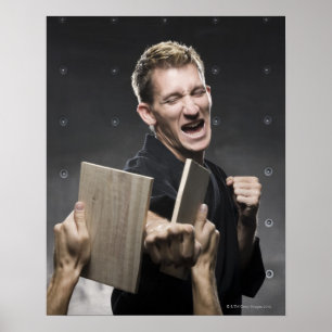 man in a black karate gi practicing martial arts poster