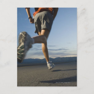Man in athletic gear running postcard