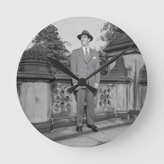 Man in Hat Round Clock