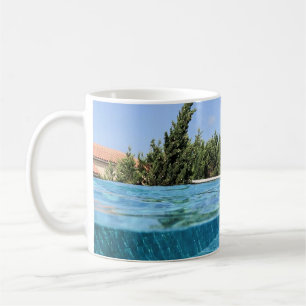 Man in swimming pool in the morning coffee mug
