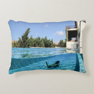 Man in swimming pool in the morning decorative cushion