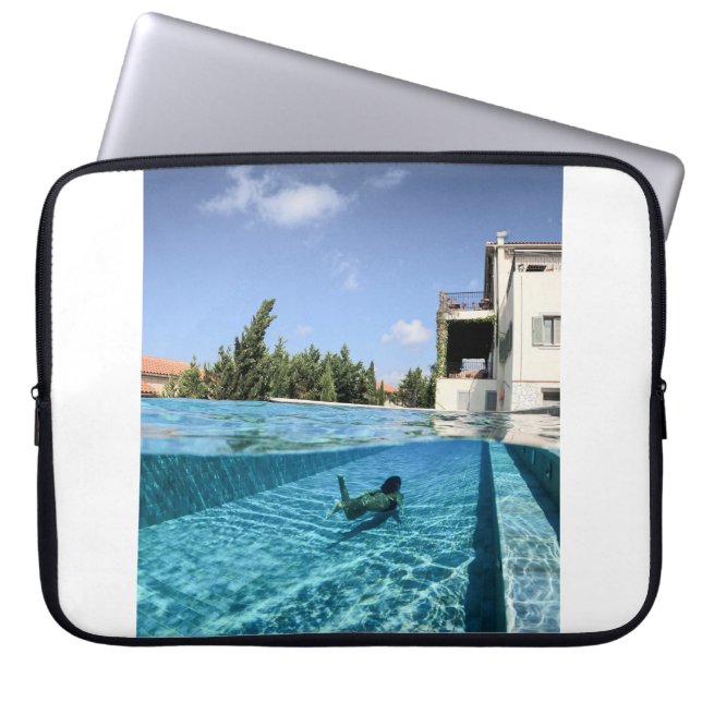 Man in swimming pool in the morning laptop sleeve (Front)
