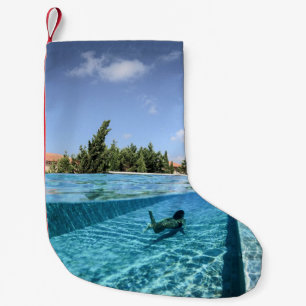 Man in swimming pool in the morning small christmas stocking