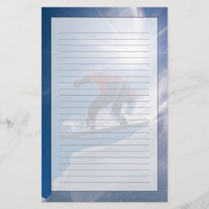 Man jumping off a large cornince on a snowboard stationery