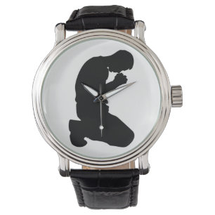 MAN KNEELING IN PRAYER WATCH