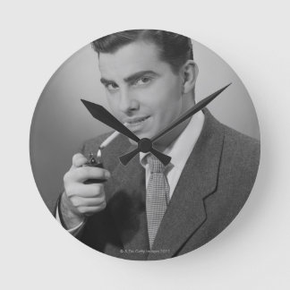 Man Lighting Cigaret Round Clock