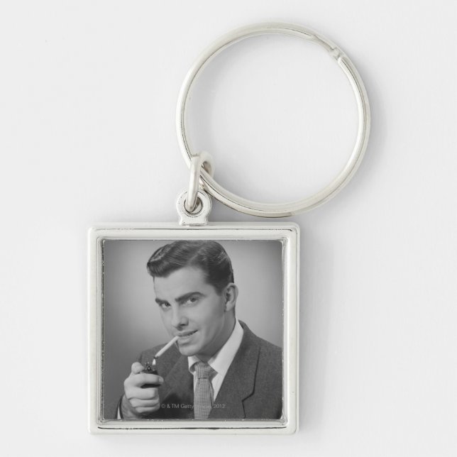 Man Lighting Cigarette Key Ring (Front)
