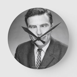 Man Making Face Round Clock