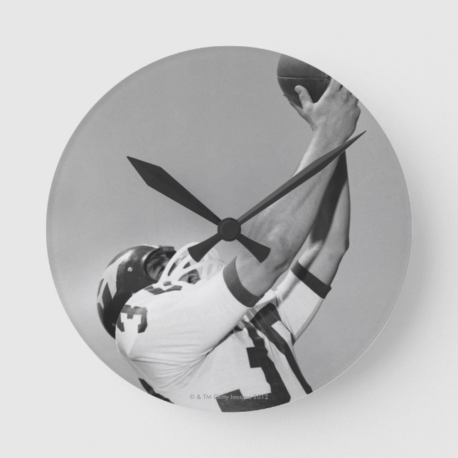 Man Playing Football Round Clock (Front)