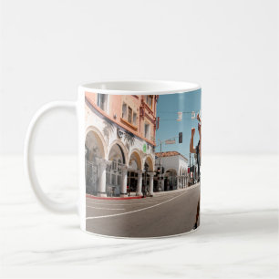Man playing skateboard coffee mug