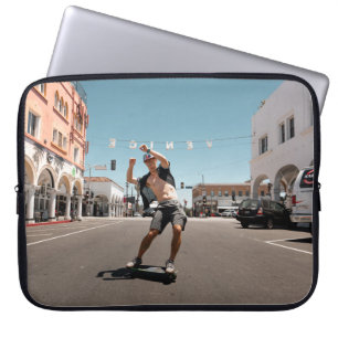 Man playing skateboard laptop sleeve