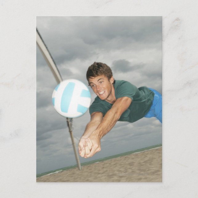 Man playing volleyball on the beach postcard (Front)