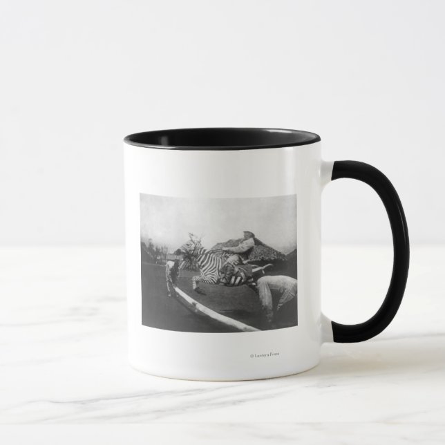 Man Riding Zebra Jumping Fence Photograph Mug (Right)