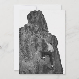 Man Rock Climbing